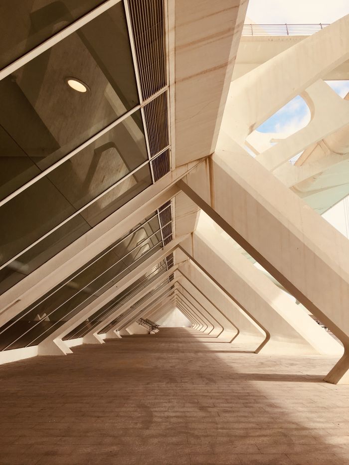 Futuristic architectural arches with glass reflections in València, Spain. Captivating modern design.